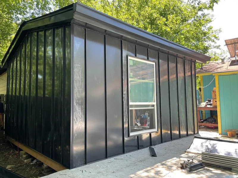 Black standing seam metal wall panels for Roof Inspection in Torrington