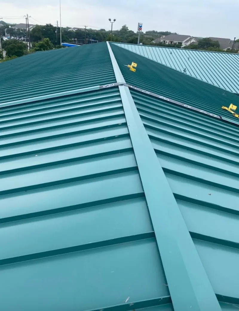 Green commercial metal roof ridge and valley for Metal Roof Repair in Torrington